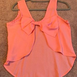 Pink cut out back with bow tank top